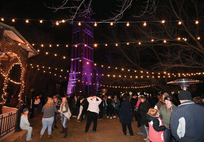 JON C. LAKEY / SALISBURY POST Revelers gather at the Historic Belltower in Downtown Salisbury to ring in the New Year of 2018.  Sunday, December 31, 2018, in Salisbury, N.C.